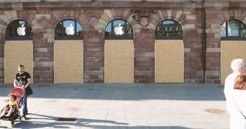 Apple Store protection after riot - closed large showcase windows Stock Footage 246089452