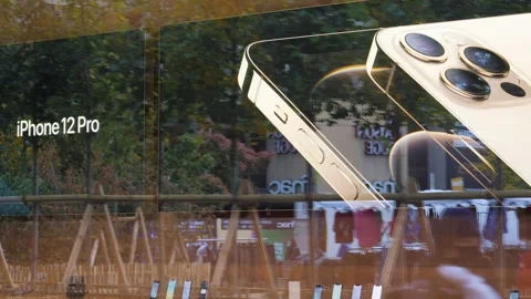 Apple Store window with the new iPhone 12 and iPhone 12 Pro Stock Footage 141773085