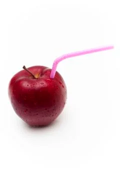 Apple with Straw Stock Photos