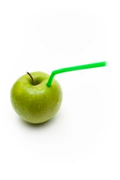 Apple with Straw Stock Photos
