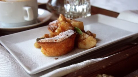 Apple strudel and coffee on the table Stock Footage 122858085