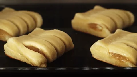 Apple Strudel are cooked in the oven. Timelaps. Stock Footage 148347167