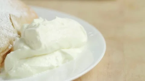 Apple strudel with cream Stock Footage 24665810