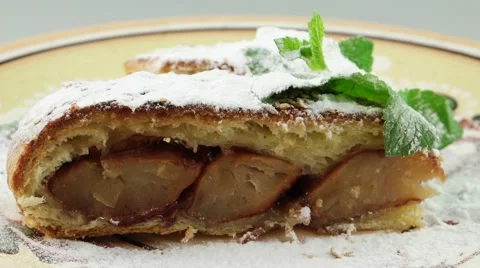 Apple strudel on the decorative plate Stock Footage 55004683