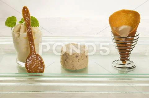 Apple strudel mousse, vanilla foam and nougat ice cream Stock Photos