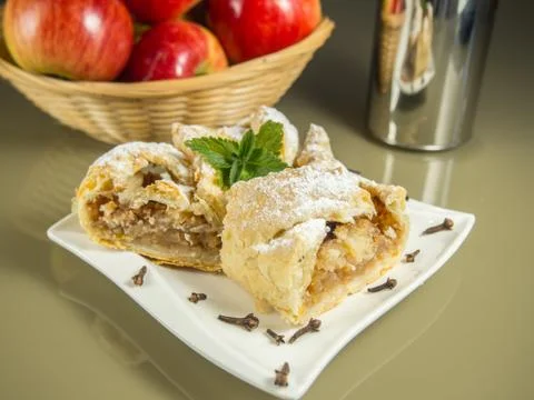 Apple strudel on table Stock Photos