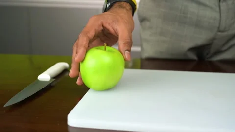 Apple on a table Video stock 135513691