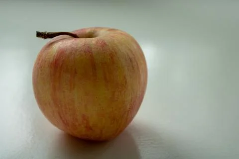 Apple on a table Stock Photos