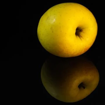 An apple is on the table Stock Photos