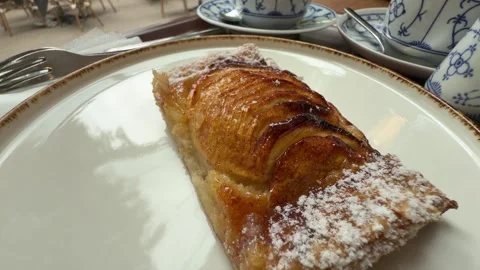 Apple Tart Slice with Powdered Sugar Served on Plate at Cafe Table Setting Stock Footage 341699718