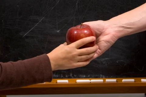 Apple for teacher - handshake variation Stock Photos