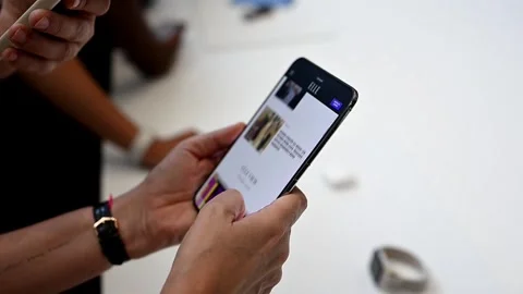 Apple unveils the iPhone Duo, its first folding iPhone, NEW YORK, US - 09 Sep 20 Stock Footage 345096115