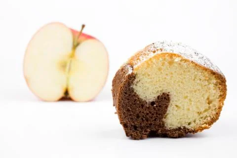 Apple versus cake Stock Photos