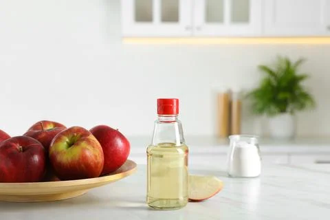 Apple vinegar and baking soda on white marble table in kitchen. Eco friendly  Stock Photos
