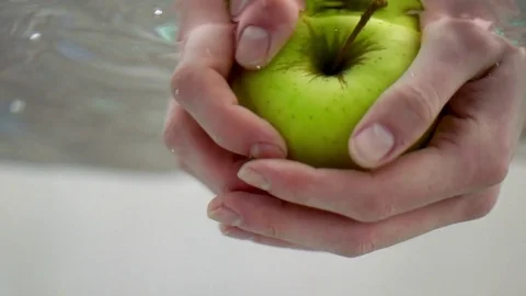 Apple washing in slow motion Stock Footage 76041122