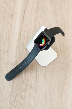 Apple watch in stand displaying mediocre daily activities Stock Photos