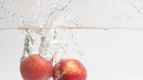 Apple In Water Stock Footage