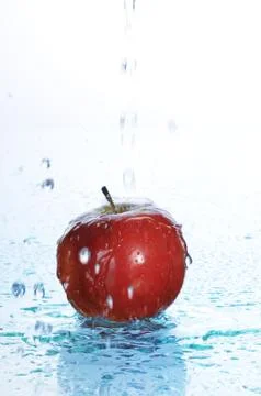Apple in water Stock Photos