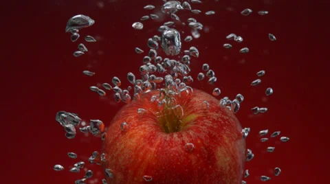 Apple in water, Slow Motion Stock Footage 31819375