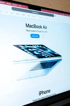 Apple website displaying macbook air personal computing device Stock Photos