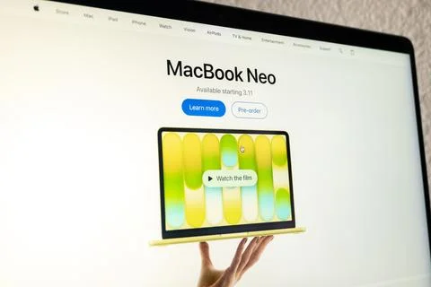 Apple website displaying macbook neo product Stock Photos