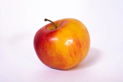 Apple on a white background with a shadow. Stock Photos