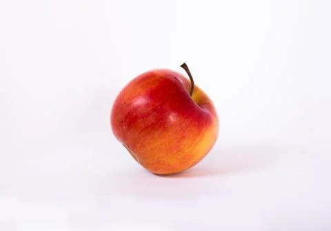 Apple on a white background with a shadow. Stock Photos