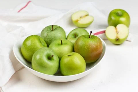 Apple on white table Stock Photos