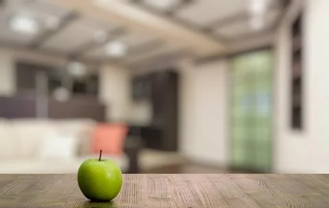 Apple on wooden table Stock Photos