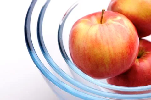 Apples and glass Stock Photos