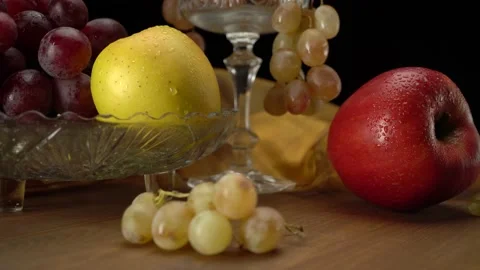 Apples and grapes on a black background. Stock-Footage 148372944