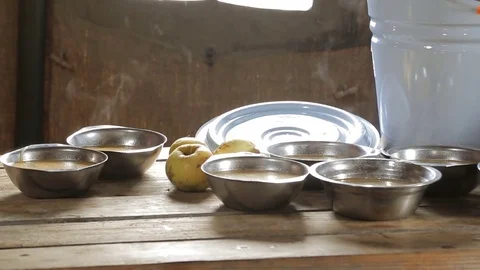 Apples and hot soup on a table Stock Footage 83849581