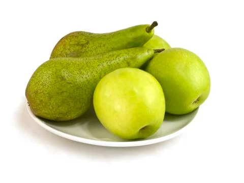Apples and pears in dish Stock Photos