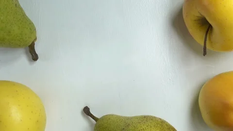 Apples and pears lie in a circle Stock Footage 142559501