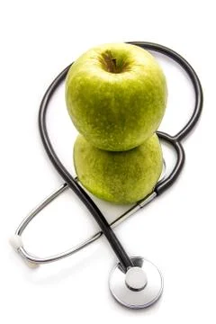 Apples and stethoscope Stock Photos