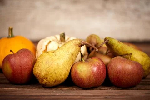 Apples and üears on a table as rustical background Stock Photos