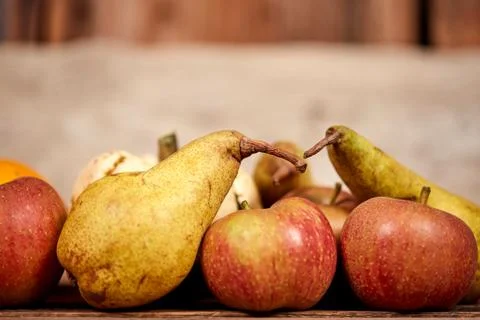 Apples and üears on a table as rustical background Stock Photos