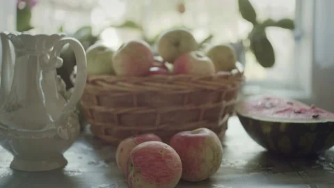 Apples and watermelon on table Stock Footage 140332475