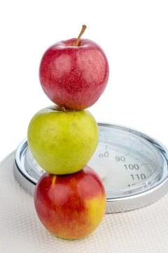 Apples on a balance Stockfoto's