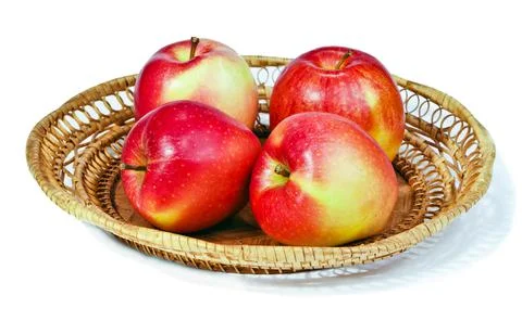 Apples in a basket Stock Photos