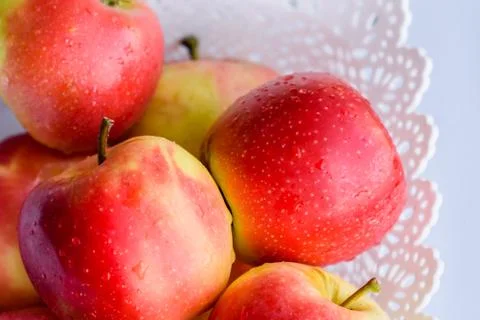 Apples in a basket on white background Stock-Fotos