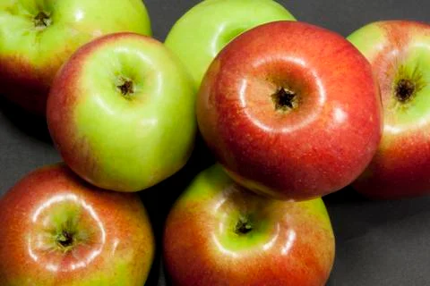 Apples on a black background Stock Photos
