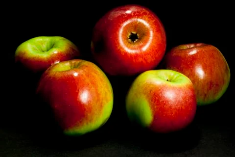 Apples on a black background Stock Photos