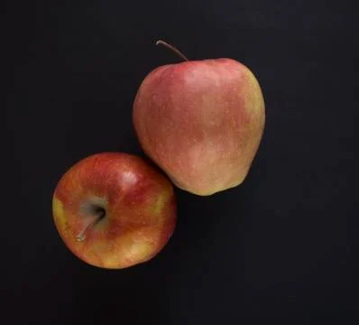 Apples on black background Stock Photos