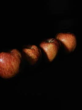 Apples on black background Stock Photos