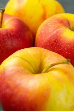 Apples on black stone table background. Front views, macro photography, close Stock Photos