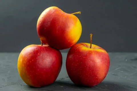 Apples on black stone table background Stock Photos