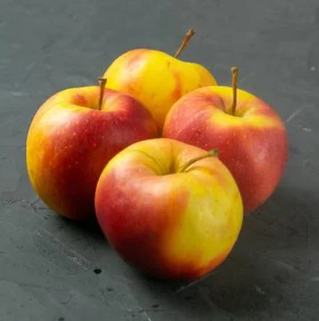 Apples on black stone table background Stock Photos