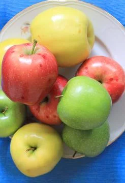 Apples on blue Stock Photos