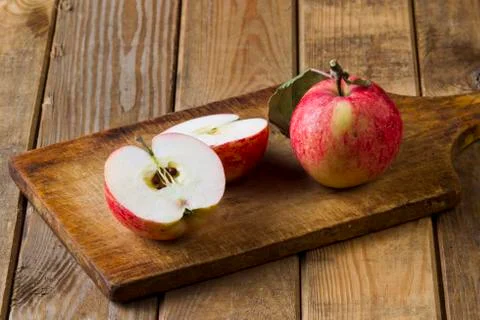 Apples on the board Stock Photos